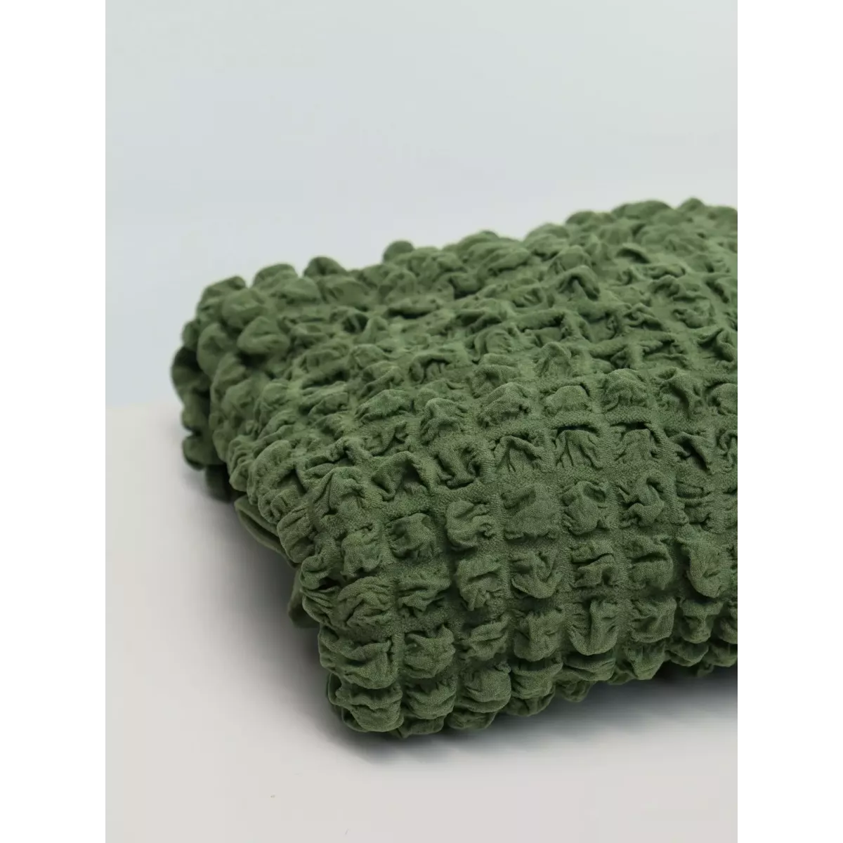 Чехол на угловой диван с оборкой зеленый